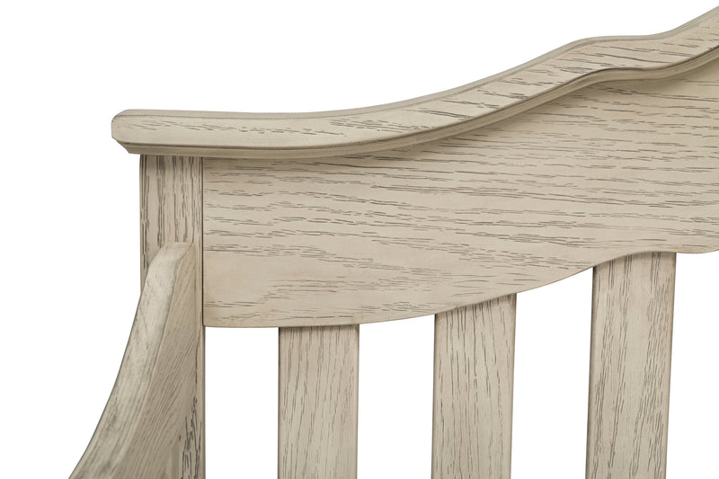 Close-up of a wooden bench with a curved backrest on a white background 13-Farmhouse 6-in-1 Convertible Baby Crib