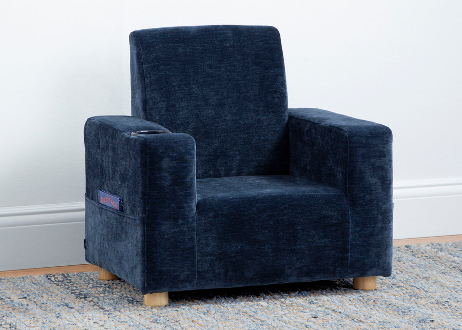 Blue armchair on a light gray rug with a white wall background 5-GapKids Upholstered Chair