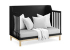 Black crib with white bedding and pillows on a white background 13-babyGap Oxford 6-in-1 Convertible Crib