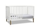 White crib with a gray mattress on a white background 21-Hendrix 4-in-1 Convertible Crib