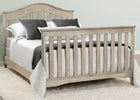 Wooden crib with bedding in a neutral-colored room 12-Farmhouse 6-in-1 Convertible Baby Crib