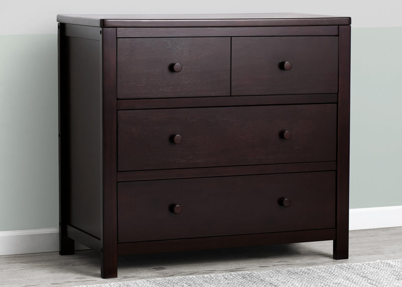 Dark wood dresser with four drawers against a gray wall. 13-3 Drawer Dresser with Interlocking Drawers