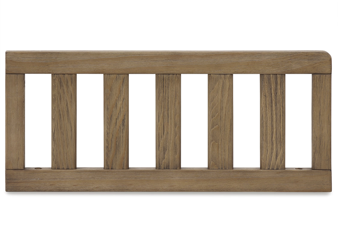 Wooden baby crib rail on a white background