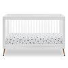 White crib with a polka dot mattress on a white background 26-Sloane 4-in-1 Acrylic Convertible Crib