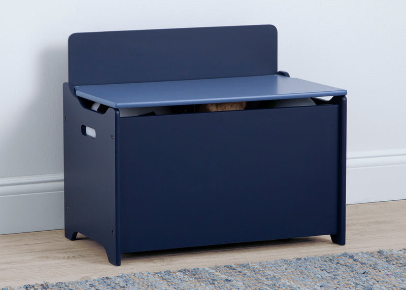 Navy blue toy storage box with a lid on a light wooden floor. 8-GapKids Toy Box