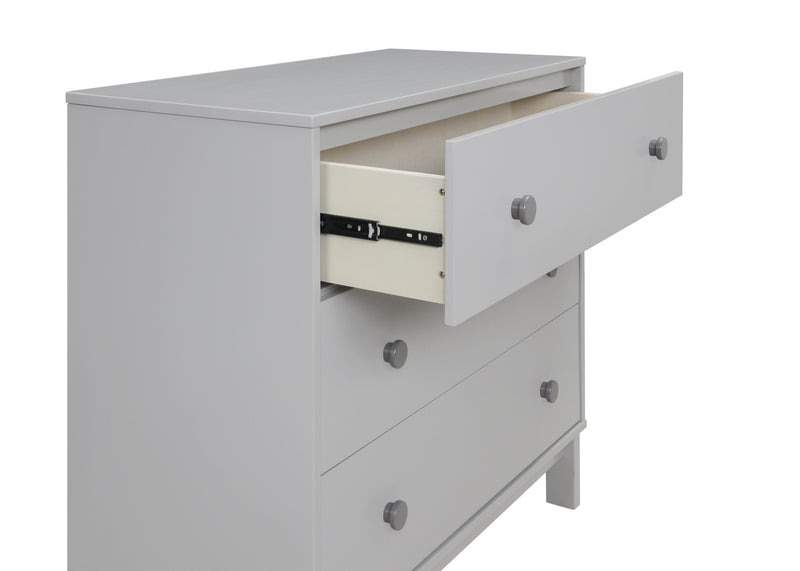 Gray dresser with open drawer on a white background