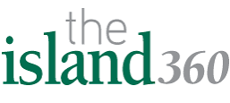 The logo for 'The Island 360' features the words 'the island 360' in a clean sans-serif typeface. 'the' and '360' are rendered in a medium gray color, while 'island' is in a darker forest green.