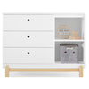 White dresser with wooden accents and shelves containing toys and a gray storage box. 16-Poppy 3 Drawer Dresser with Cubbies