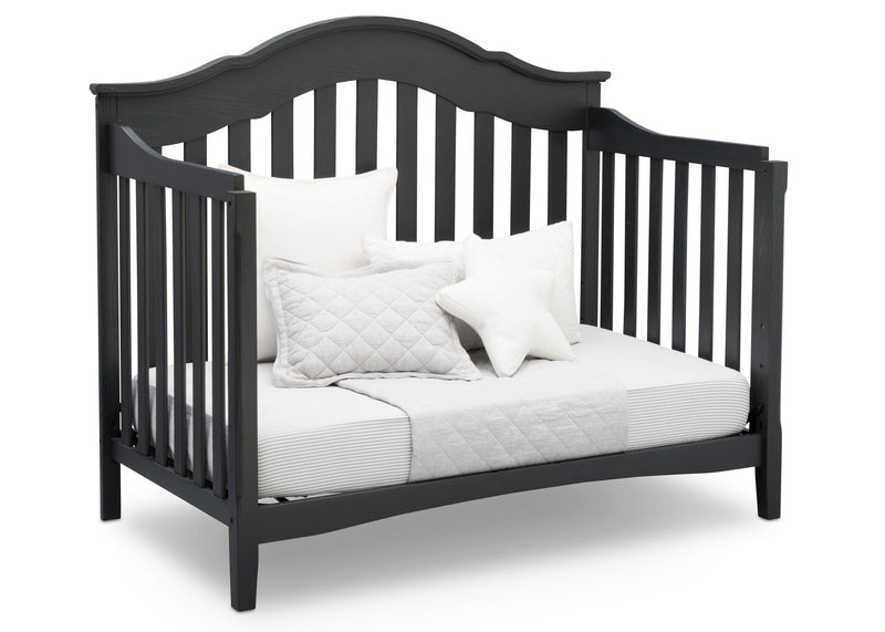 Black crib with white bedding on a white background 30-Farmhouse 6-in-1 Convertible Baby Crib