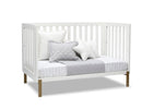 White crib with gray bedding and pillows on a white background 23-Hendrix 4-in-1 Convertible Crib