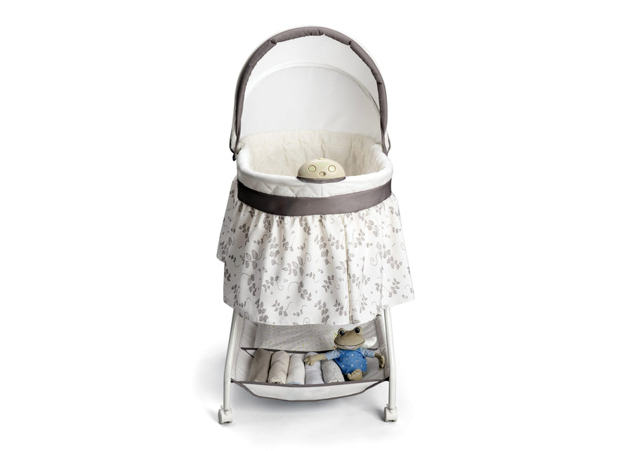 25021 138 delta falling leaves bassinet front props 4-Deluxe Sweet Beginnings Bassinet