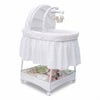 Delta Children Ivory (124) Slumber Time Elite Gliding Bassinet, Right Side View a1a 1-Slumber Time Elite Gliding Bassinet
