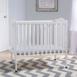 Delta Children Bianca (130) Portable Folding Crib with Mattress, room shot a1a 1-Portable Folding Crib with Mattress