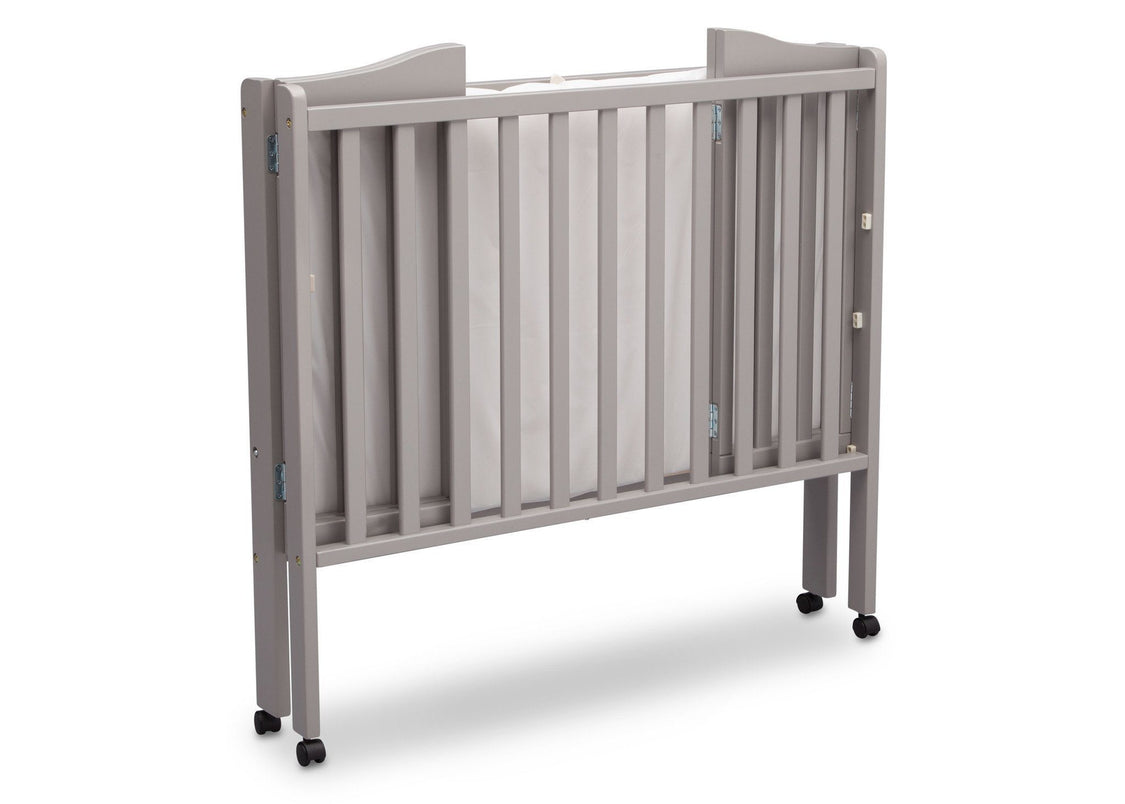 Delta Children Grey (180) Portable Folding Crib with Mattress, angled folded view b5b