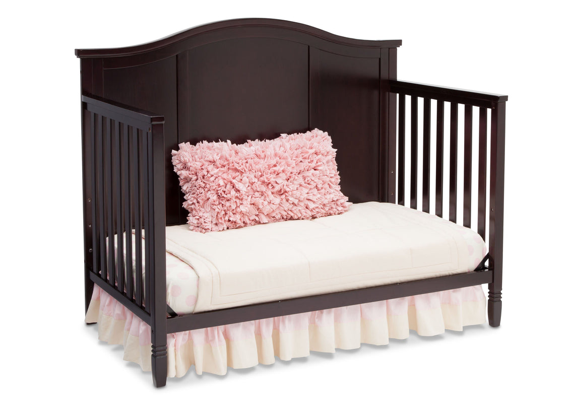 Delta Children Dark Chocolate (207) Maverick 4-in-1 Crib, angled conversion to daybed, a5a