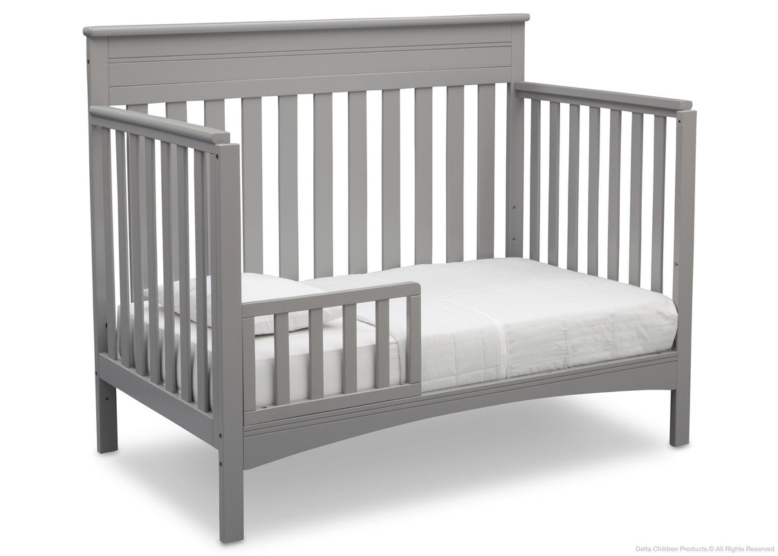 Delta Children Grey (026) Fabio 4-in-1 Crib Side View, Toddler Bed Conversion with Toddler Guardrail c4c