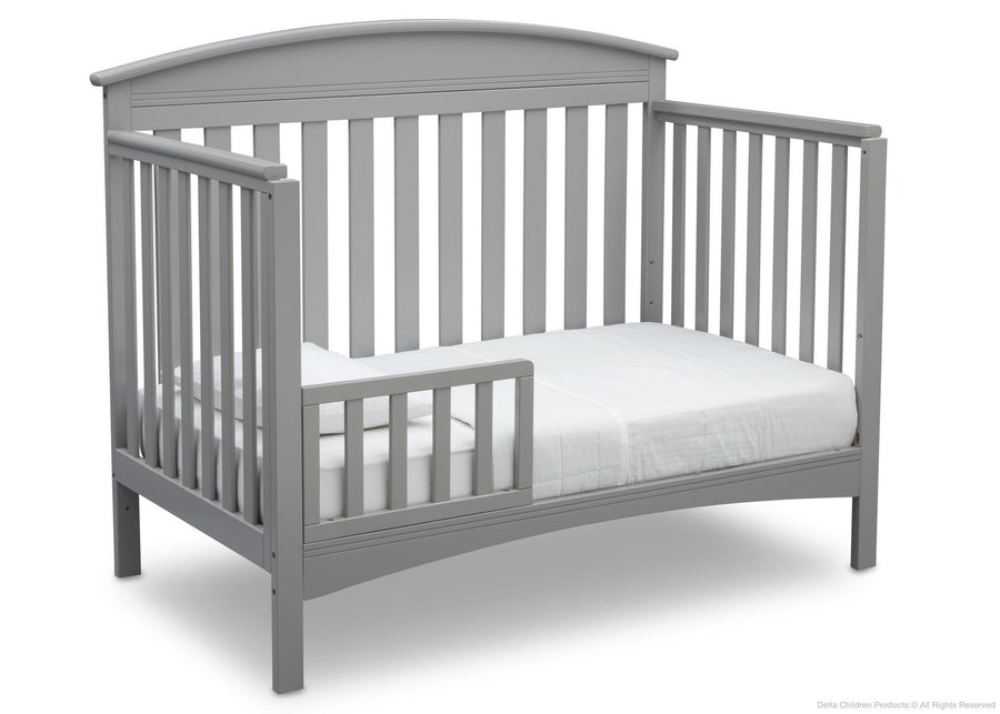 Delta Children Grey (026) Abby 4-in-1 Crib Toddler Bed Conversion Side View a3a 3-Abby 4-in-1 Convertible Crib