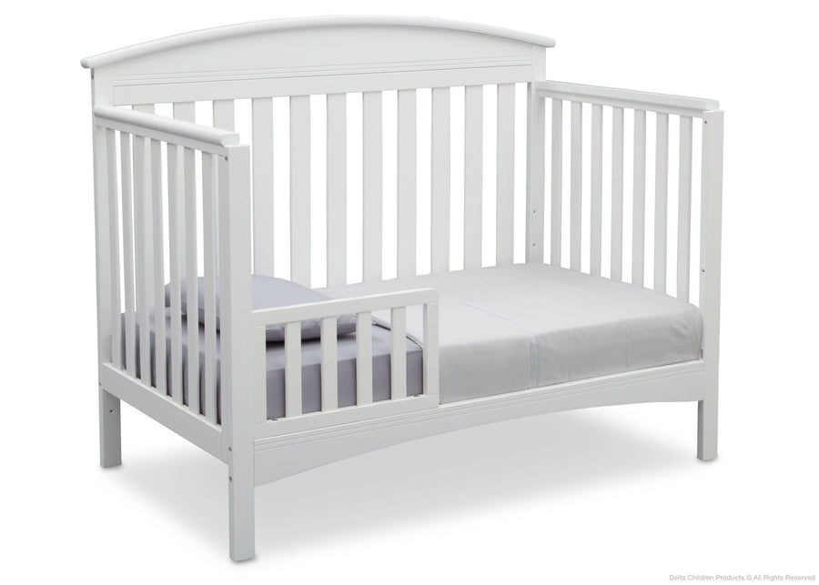 Delta Children Bianca White (130) Abby 4-in-1 Crib Toddler Bed Conversion Side View b4b 9-Abby 4-in-1 Convertible Crib