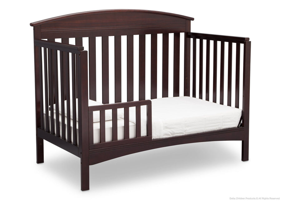 Delta Children Dark Chocolate (207) Abby 4-in-1 Crib Toddler Bed Conversion Side View c4c 15-Abby 4-in-1 Convertible Crib