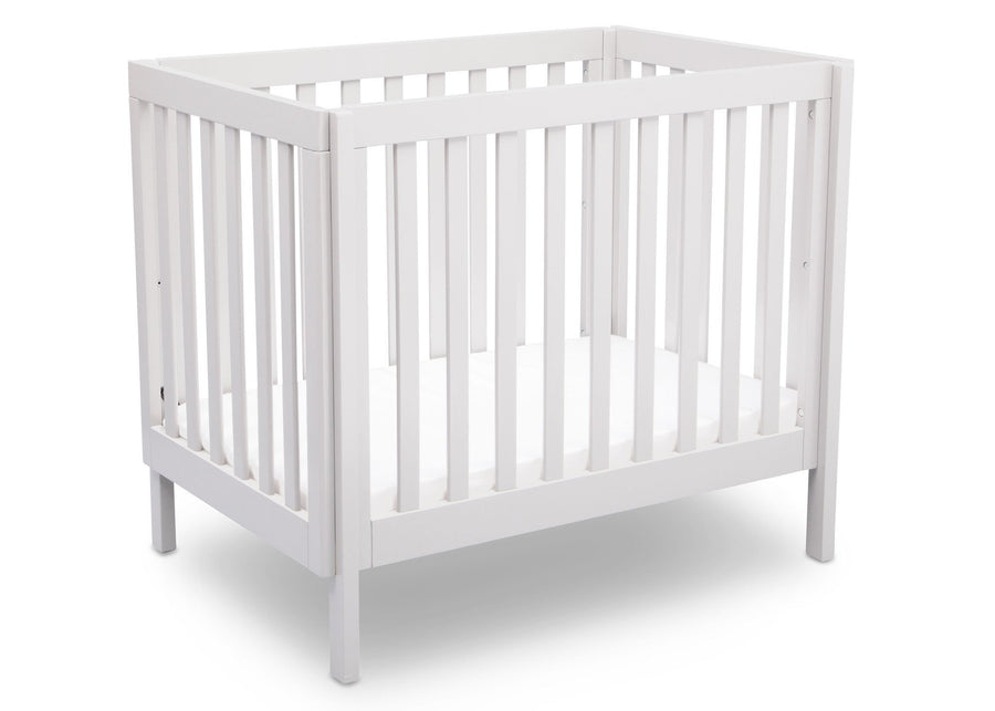 Delta Children White (130) Bennington Elite Mini Crib with Mattress, Angled View, a3a 4-Bennington Elite Mini Crib with Mattress