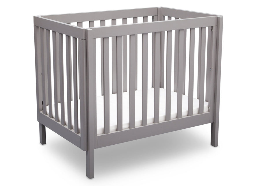 Delta Children Grey (180) Bennington Elite Mini Crib with Mattress, Angled View, c3c 2-Bennington Elite Mini Crib with Mattress