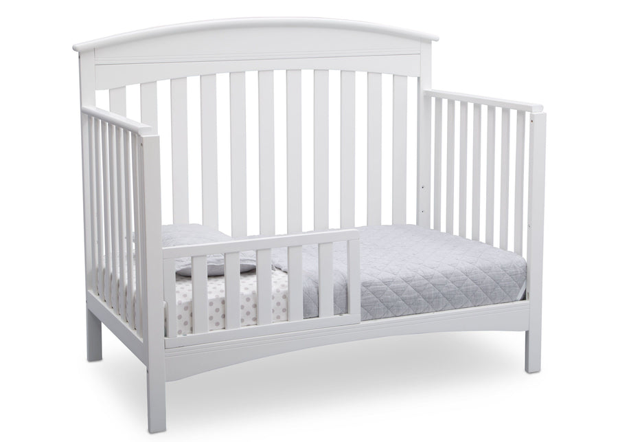 Delta Children Bianca (130) Bennington Elite Arched 4-in-1 Convertible Crib, Toddler Bed Angle, b4b 10-Bennington Elite Arched 4-in-1 Convertible Crib