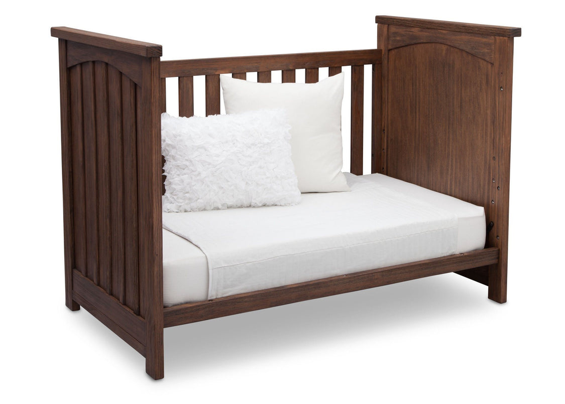 Serta Rustic Oak (229) Northbrook 3-in-1 Crib, Day Bed Conversion with Side View b5b
