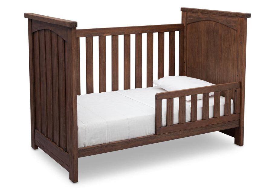 Serta Rustic Oak (229) Northbrook 3-in-1 Crib, Toddler Bed Conversion with Side View b4b 9-Northbrook 3-in-1 Crib