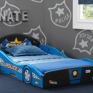 Delta Children Police Car (999) Room Shot e2e Assorted (999) 11-Police Car Plastic Sleep and Play Toddler Bed
