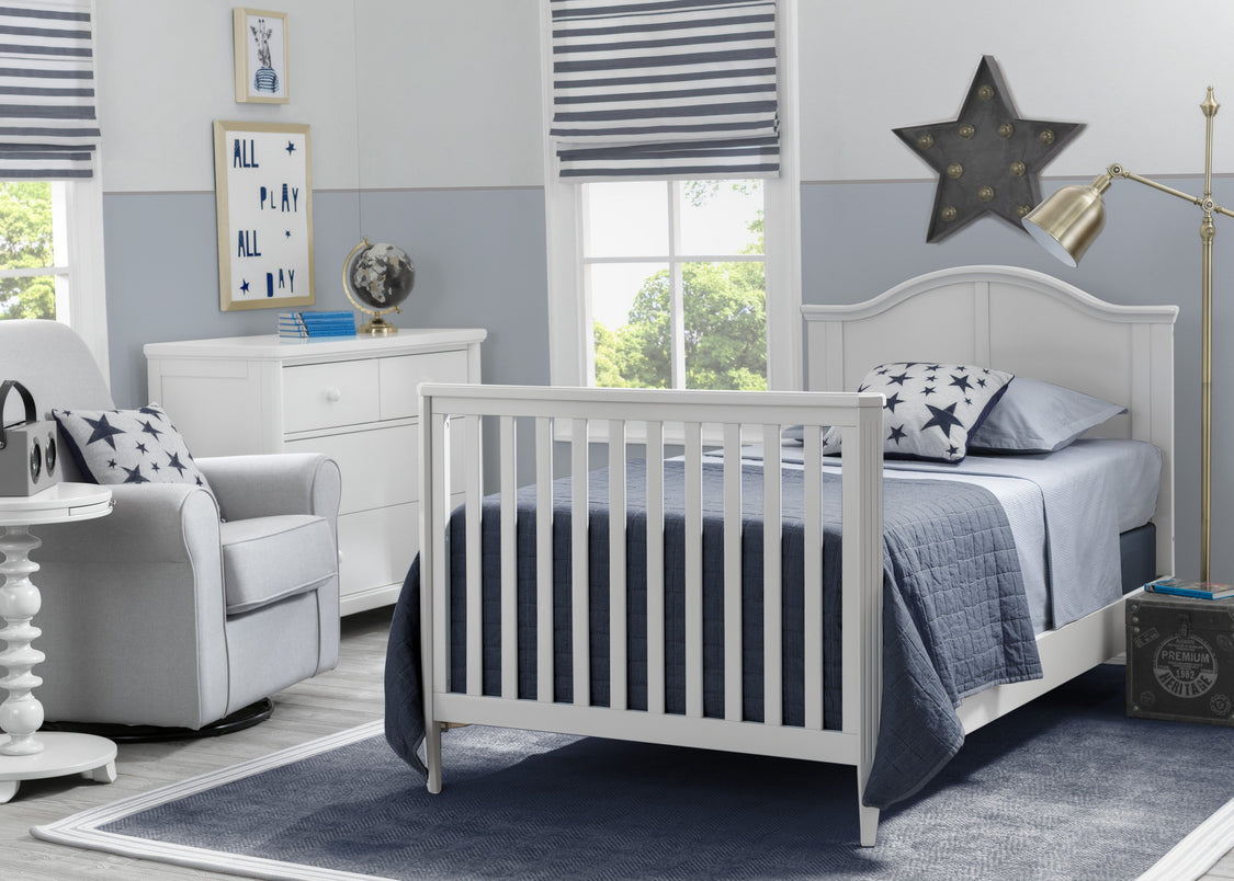 Delta Children Bianca White (130) Mini Convertible Baby Crib with Mattress and 2 Sheets Twin Bed Room View