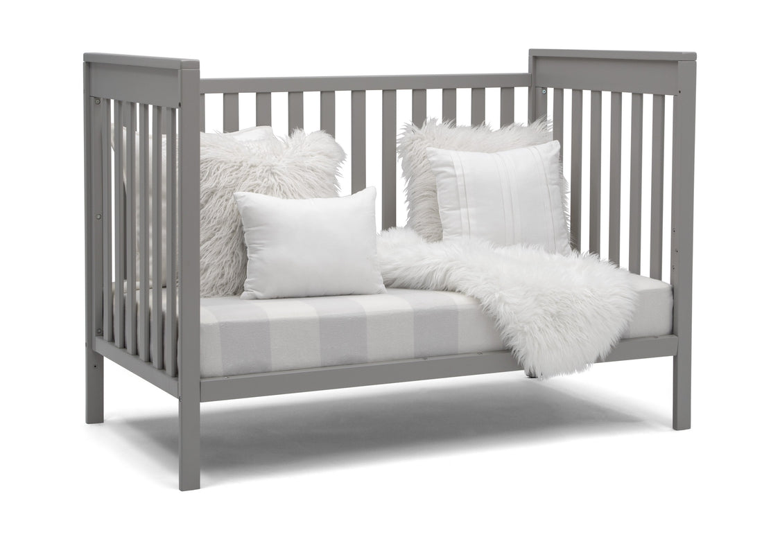 Delta Children Grey (026) Mercer 6-in-1 Convertible Crib, Right Sofa Silo View