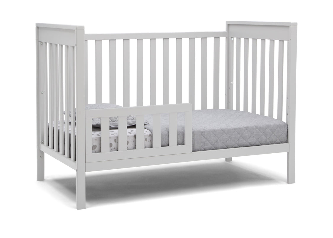 Delta Children Bianca White (130) Mercer 6-in-1 Convertible Crib, Right Toddler Bed Silo View