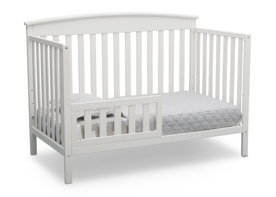 Delta Children Bianca White (130) Finley 4-in-1 Convertible Baby Crib Toddler Bed Angled View a5a 6-Finley 4-in-1 Convertible Baby Crib